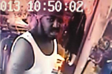  Chicago police released this image from surveillance video of the man they said beat a store clerk with a baseball bat because the store didn't have size XXXL T-shirts. 
