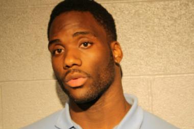 Kenyon Hoskins, 23, allegedly lifted another man's wallet and went straight to a Water Tower Place lingerie shop to use it.
