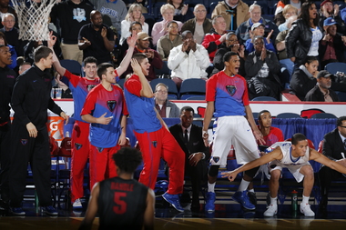  DePaul's Bench Mob — walk-on juniors Peter Ryckbosch, Cory Dolins and David Molinari and freshman Joe Hanel — have become developed a cult following for their antics on the bench after great moments from their teammates on the court. 