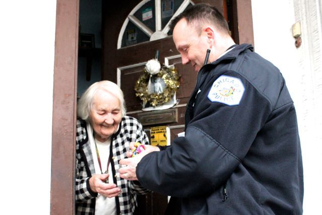 <p>Marcella Juszynski insisted on giving Officer David Uting a generous handful of candy when he came to her door on Halloween to say 'hello.'</p>
