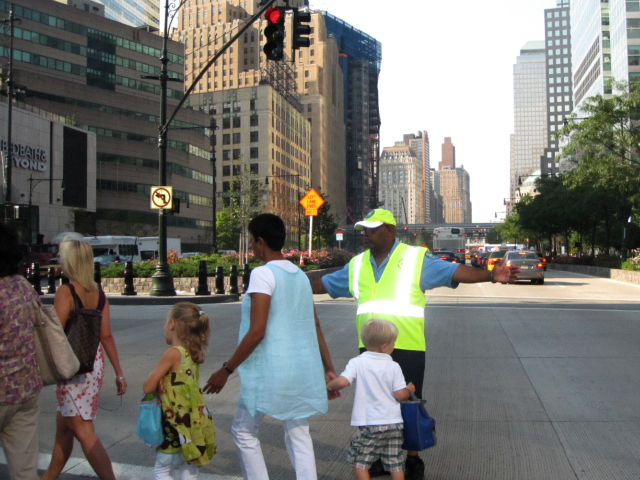 Pedestrian managers make it safer to cross West Street in Lower Manhattan. Assembly Speaker Sheldon Silver hopes to add similar crossing guards to Delancey Street. 