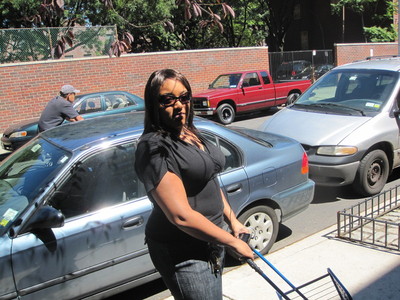 Vesha Wright, who has lived on 123rd St. for seven years, opposes the 8-story building.