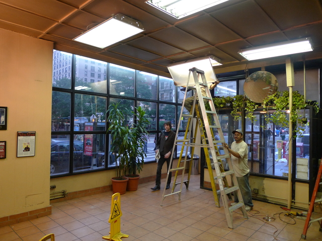 Workers stripped down H&H Bagels' West 80th Street store on Monday. Officials say it will likely close later this week.