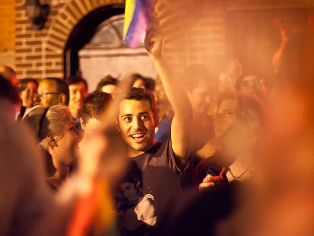 Revelers cheer the passage of historic gay marriage legislation outside the Stonewall Inn in the Village on June 24, 2011.