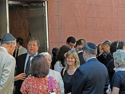 Family and friends mourn Marilyn Dershowtiz outside Riverside Memorial Chapel at 180 West 76th St. on July 5, 2011.
