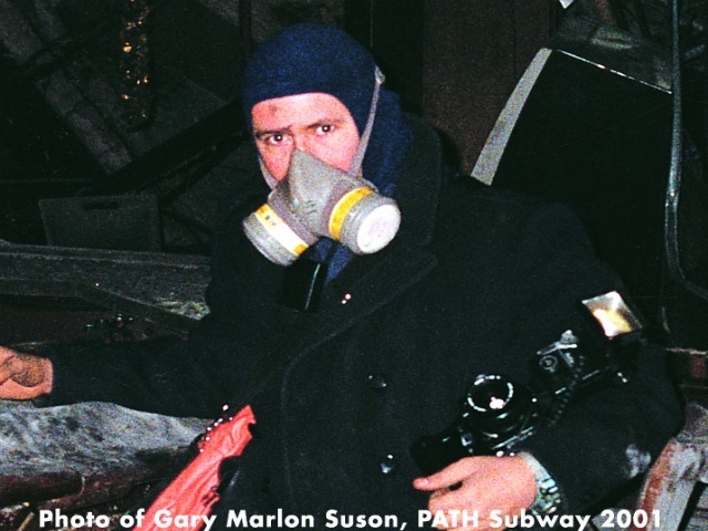 Gary Marlon Suson stood with a gas mask in the PATH subway station.