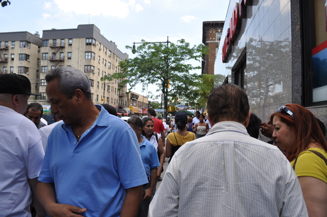 St. Nicholas Avenue is almost impossible to navigate, because of street vendors clogging the street.