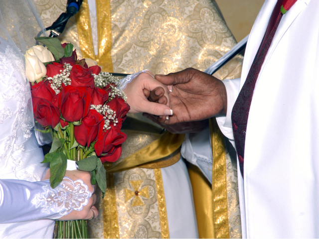 Kawane Harris and Jeanette Coleman had a wedding ceremony in their church August 2010.