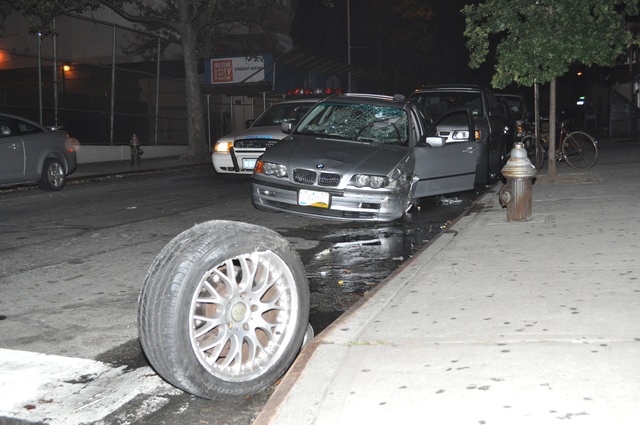 The silver BMW police said hit a man in Harlem.