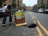 Sinkhole 'Fixed' With Broken Table