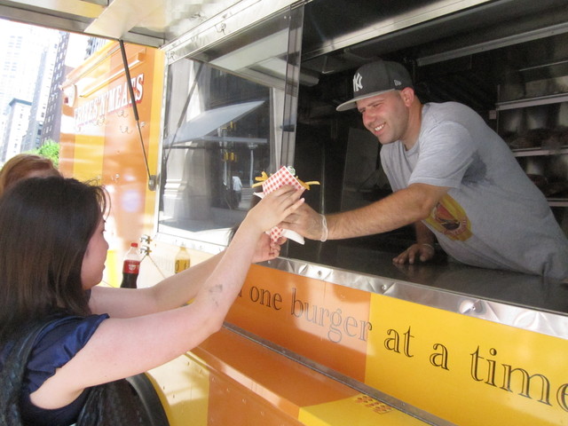 Frites 'N' Meats owner Ali Beydoun gave away free fries Aug. 8, 2011 to celebrate the food truck's reopening. 
