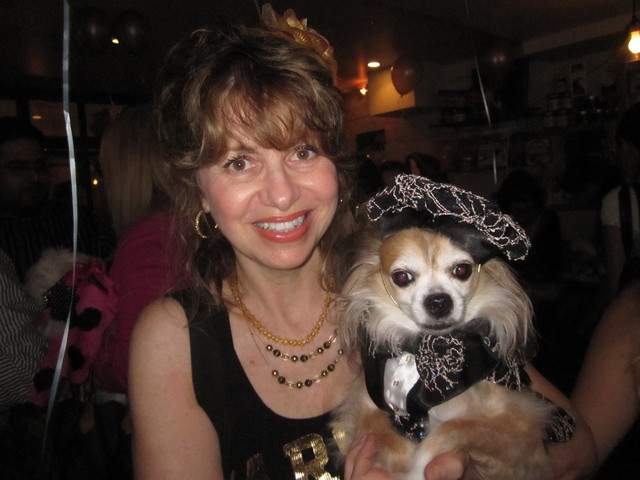 Chico, a long-haired Chihuahua, with owner Stella Panzarino. 