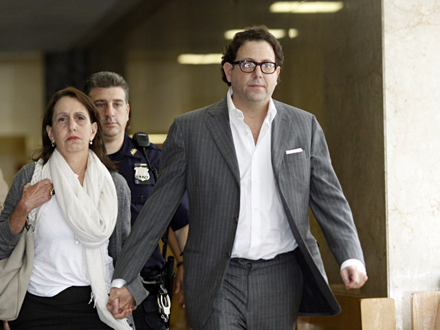 Andrew Albert (r.) and a woman who was identified as his sister leave Manhattan Supreme Court on Aug. 15, 2011. 