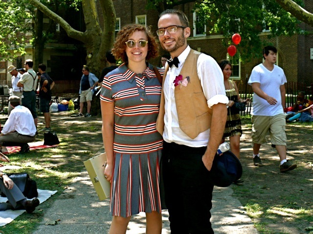 An ideal striped drop waist day-dress updated flapper flair. He is wearing tan linen vest at a very modern ankle length.  