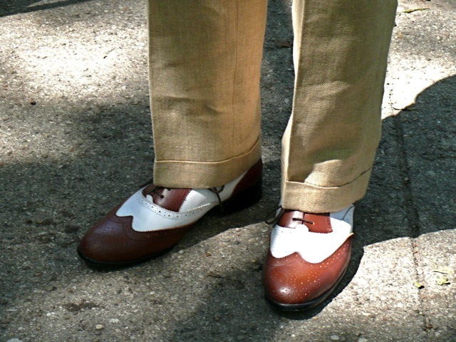A wonderful example of the slim cut pant no break most popular during the early 20s, paired with a tan and white spectator brogues