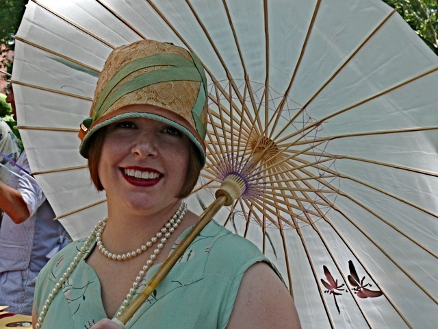 Here is an authentic 1920 cloche hat with sea foam green grosgrain ribbon trim and lace. Her dress was a matching drop waist silhouette