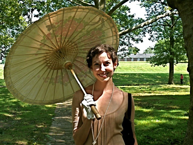 Appropriate hues of green and taupe in a very fine summer knit ensemble. 