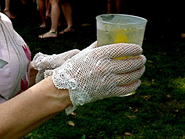 Delicate cotton crocheted gloves with large scalloped edges, added an individual and stylish touch.
