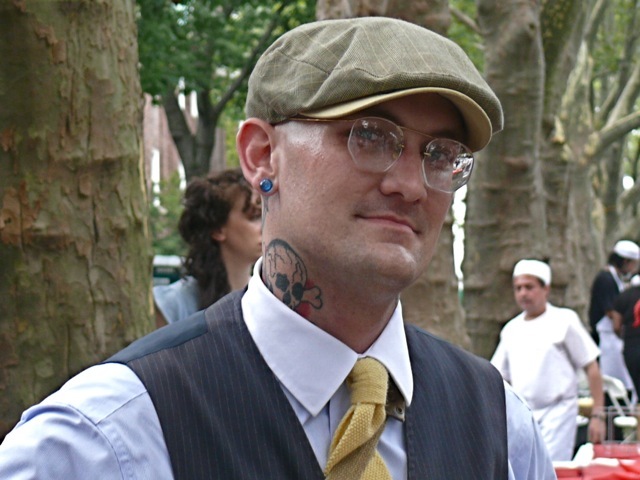 David P. Lochner in a newsboy cap. He is the author of the internet site Art of Manliness. 
