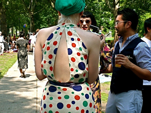 The backless look became popular during the 20s and 30s, spurred by the fashion of sun tanning. Here is a very whimsical example of a vintage inspired casino dress style. 