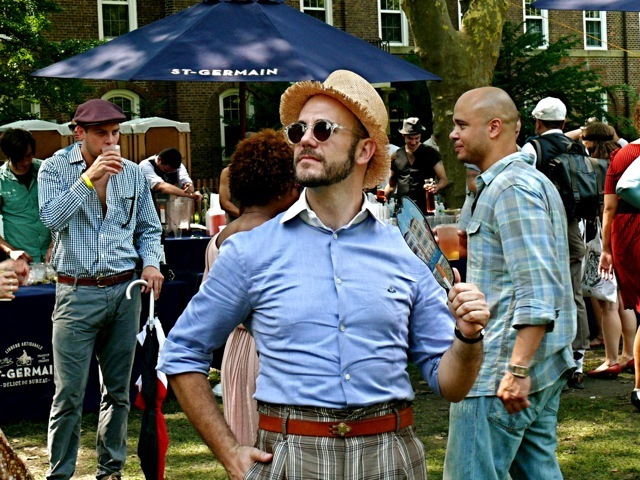 Cator Sparks is wearing a fitted contrast collar, fine cotton shirt and plaid shorts with vintage details.