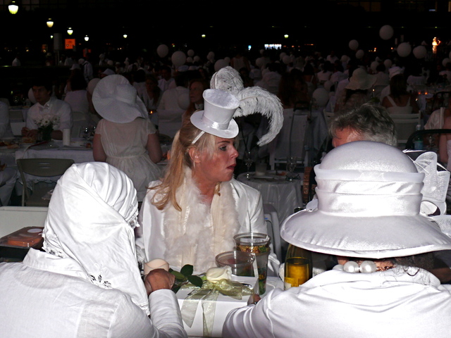 Women wore feathers, pillbox hats, lace and pearls.