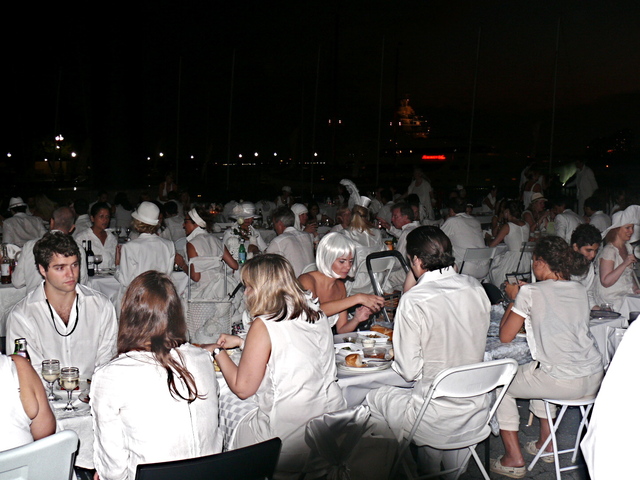 White suits were very popular for men, and white cotton summer dresses for women.
