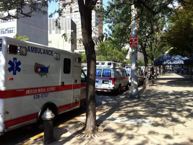 Eleven ambulances were lined on East 34th Street between First Avenue and the East River in anticipation of the evacuation of NYU Hospital on Aug. 26, 2011.