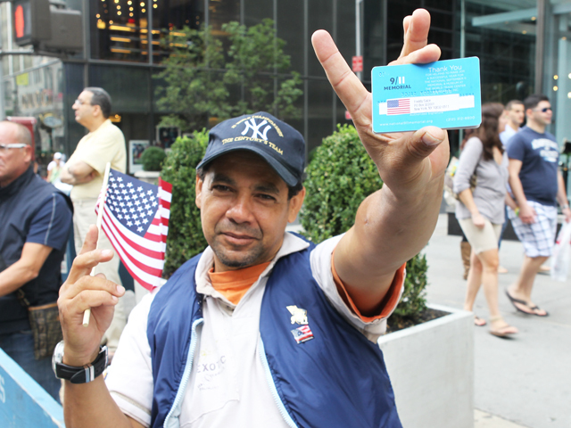 Freddy Salce, 40, a nurse said, holds an American flag at the Labor Day Parade on Fifth Avenue on Sept. 10, 2011. 