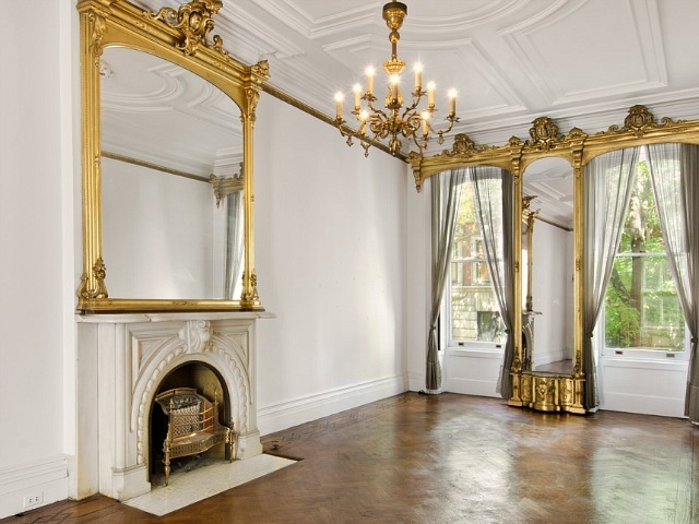 The 4,100-square-foot townhouse at 64 Perry St. boasts four floors, 10 rooms and six fireplaces. 