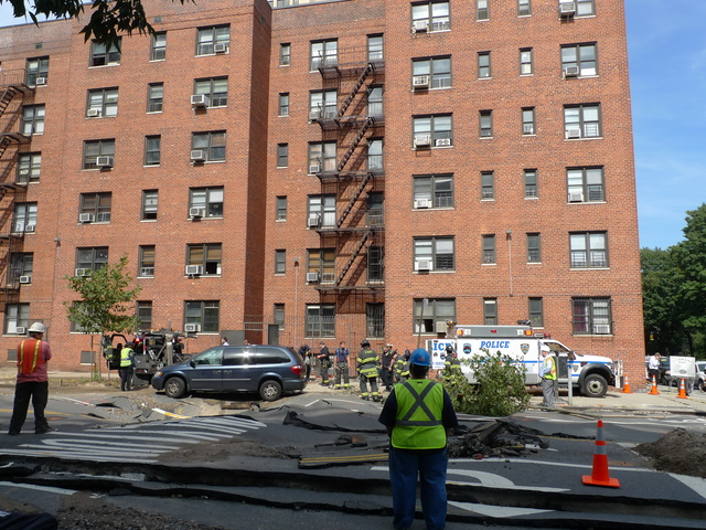 Crews removed a tree and a no parking sign and towed a minivan so they could excavate a broken water main on West 106th Street and Central Park West.