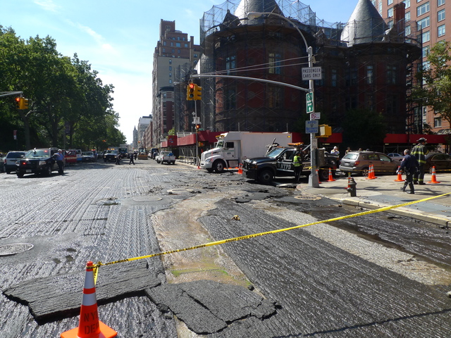 The intersection of Central Park West and West 106th Street was closed to traffic after a water main break.