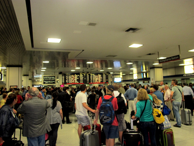 Customers pile up inside Penn Station after power outages on an Amtrak-run line stalled 4 NJ Transit trains, Sept. 22, 2011.