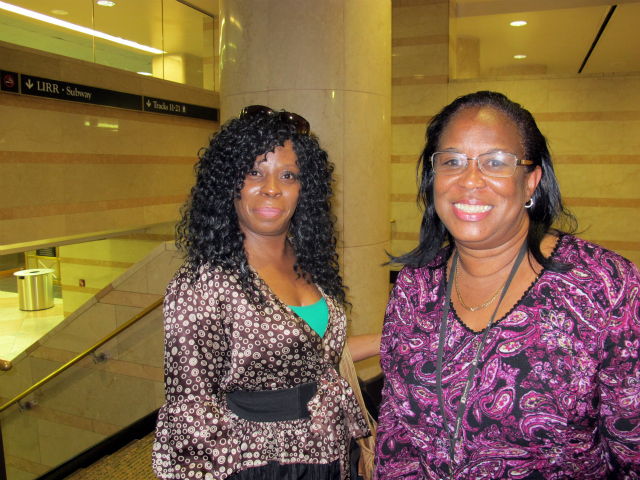 Mae Texiera (L) and her friend were Lucy Cudjoe-Jarvis, 54, (R) were trapped on a NJ Transit train inside a Hudson River tunnel for 2 1/2 hours because of a power outage, Sept. 22, 2011.