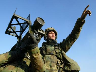 Soldiers aim a Stinger missile launcher during a military exercise on February 27, 2004 in Yeonchun, South Korea.