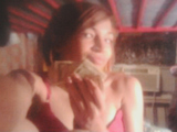 Photos of Cash From Afrika Owes' Cell Phone Shown to Gang Trial Jury