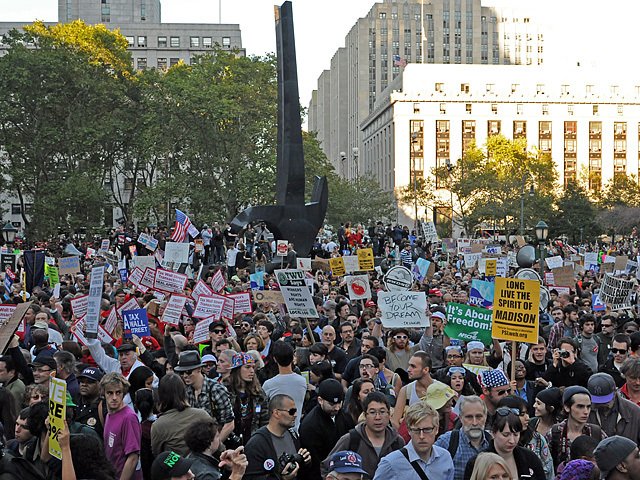 Protesters listen to speakers during the rally Oct. 5, 2011. 