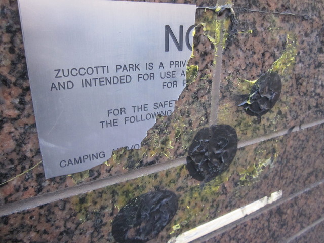 Brookfield Properties posted a sign in Zuccotti Park with new rules, but it has mostly been torn down. 