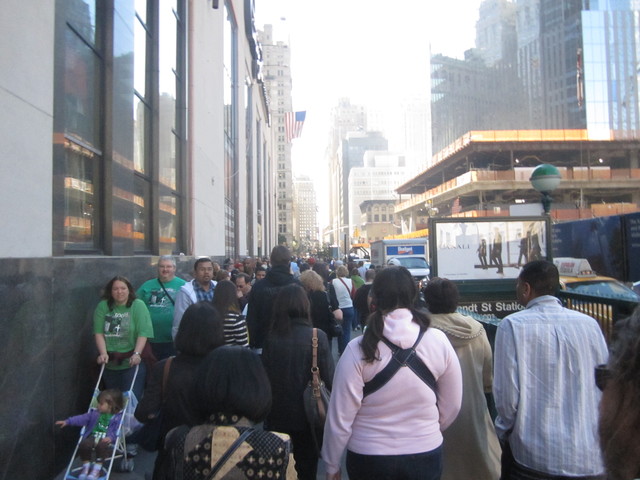 The sidewalks on Church Street across from the World Trade Center site are crowded. 