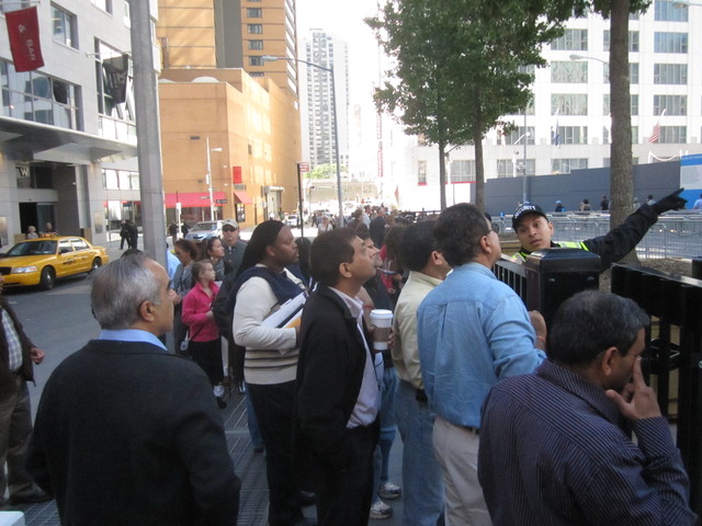 The sidewalk on Albany Street near the 9/11 Memorial is so crowded that some people say they are forced to walk in the street. 