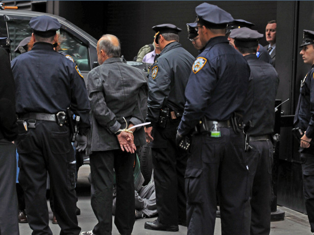 The protesters were handcuffed using plastic cuffs. 