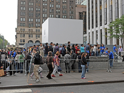 Apple devotees line up outside the Fifth Avenue Apple Store on Oct. 14, 2011 for the release of the iPhone 4S.