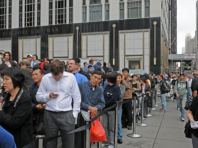 Long lines form at the Apple Store on Fifth Avenue on Oct. 14, 2011 for customers waiting to buy the new iPhone 4S.