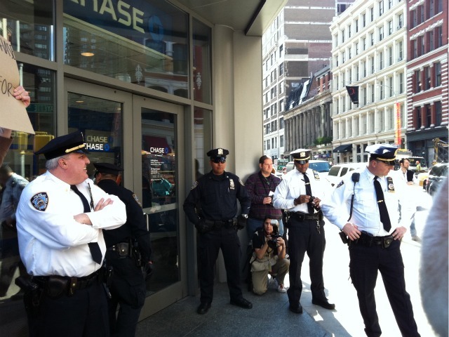 Cops stand guard at a Chase bank branch on Astor Place and Lafayette Street where Occupy Wall Street protesters gathered on Oct. 15, 2011.