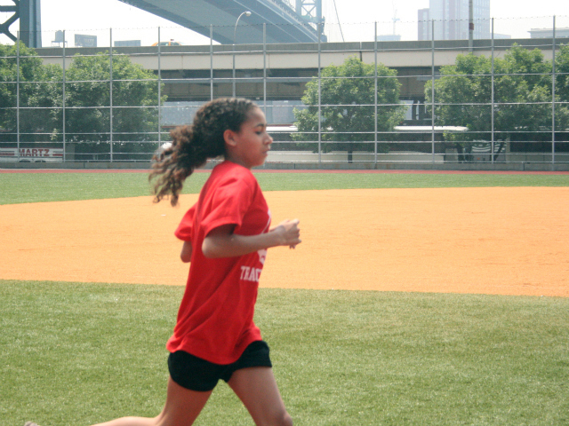 A runner from the Manhattan Academy of Technology, the middle school with the most sports offerings in the city. 
