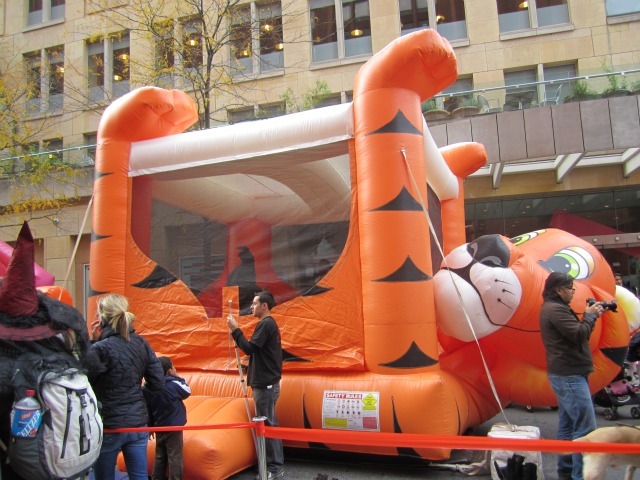 <p>Kids were greeted by a bouncy slide, music, popcorn and face painting at the annual children's Halloween Parade.</p>
