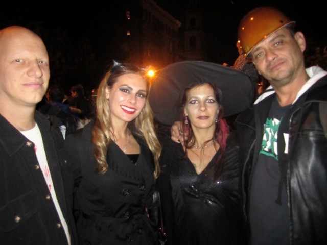 <p>Miguel C., right and friends said they liked costumes of E.T. and the Brooklyn Bridge in the parade.</p>
