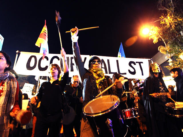 <p>Occupy Wall Street protesters join the annual Halloween parade.</p>
