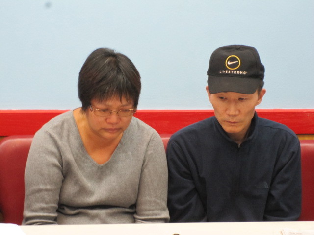 Su Zhen Chen and Yan Tao Chen, the parents of Pvt. Danny Chen, at a press conference on Tues., Nov. 1, 2011.