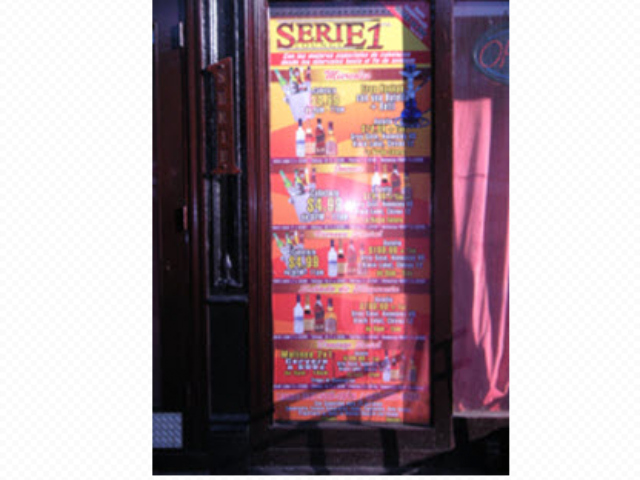 A drink menu posted outside Serie 1.